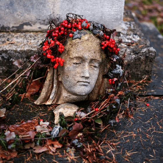 the head of a broken sculpture in lychakiv cemetery lviv