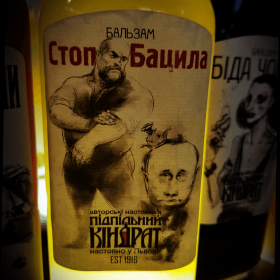 a liqueur bottle label depicting a crimean tatar humiliating putin