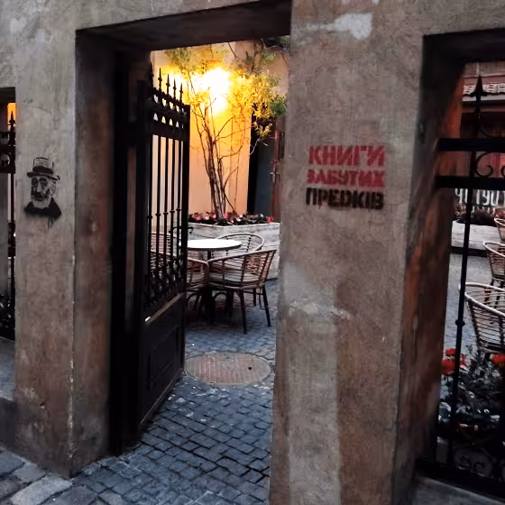 secluded entrance to a wine bar in the armenian quarter of lviv