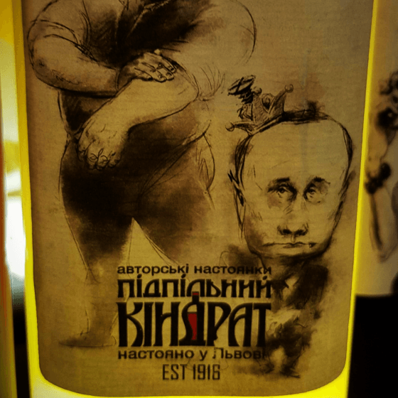 a liqueur bottle label depicting a crimean tatar humiliating putin