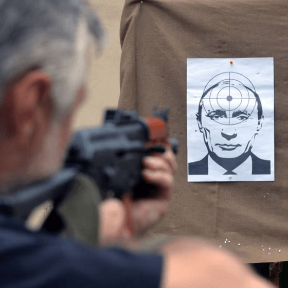 airsoft marksman firing at the face of russian terrorist putin