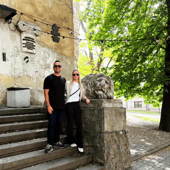 travellers exploring the historic powder tower fortification in lviv old town